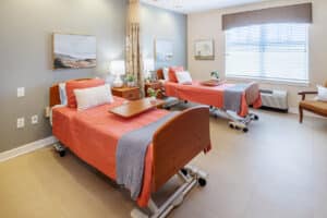 A semi-private bedroom at Patewood Post Acute